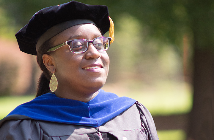 NyashaGuramahtunhuCooperss walks in regalia on opening convo.