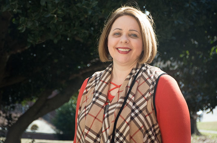 Faculty member Tonya Harter on Mount Vernon Porch.