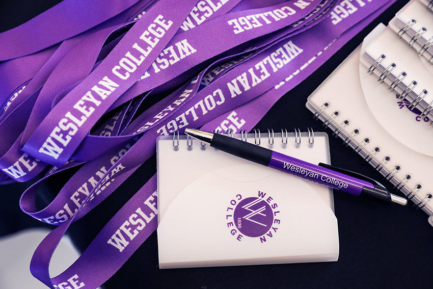 Notebook and lanyards with wesleyan logo