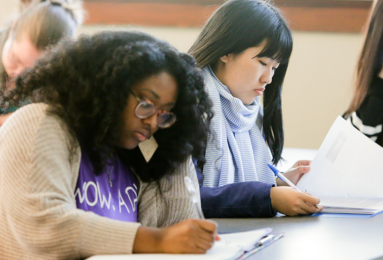 Students take notes during class