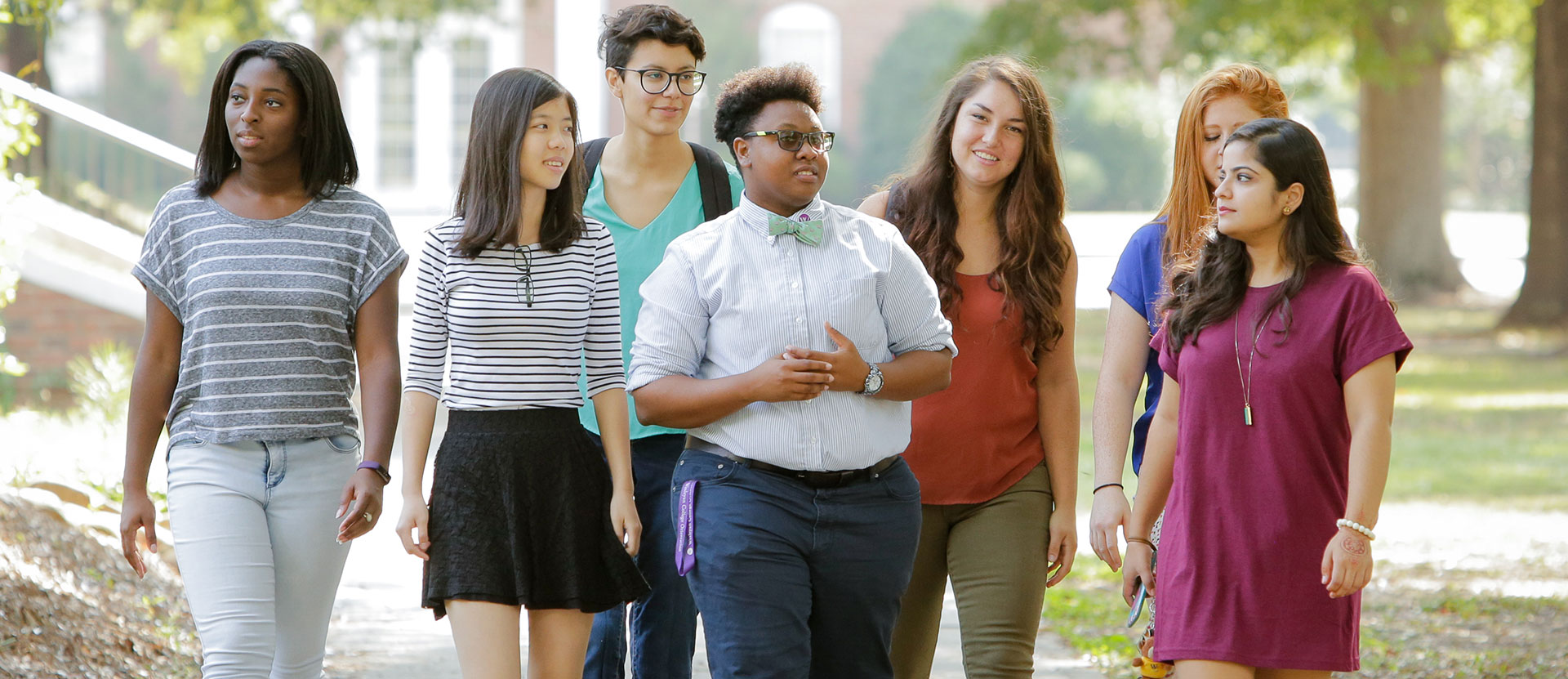 Group of students walking in the quad